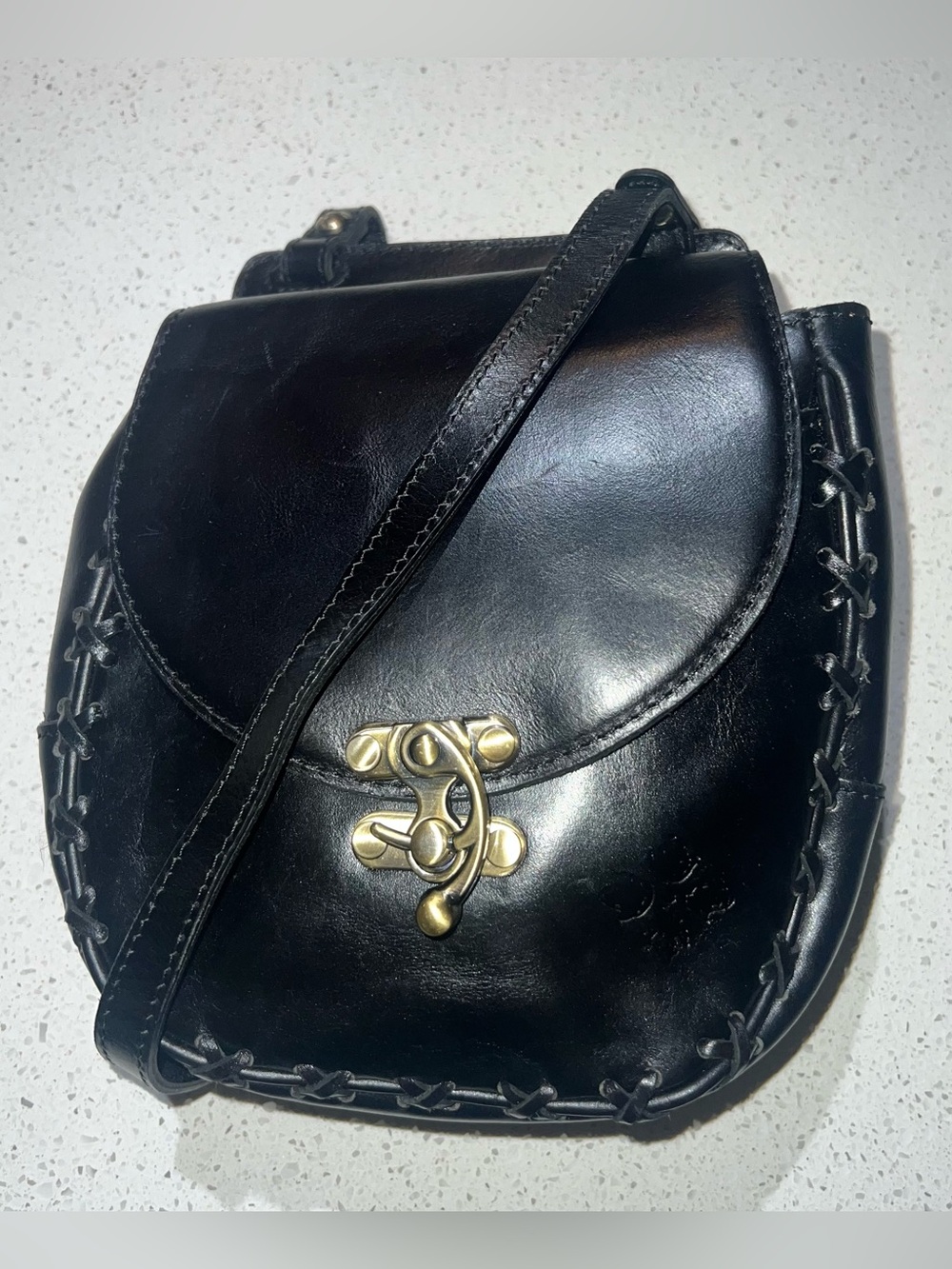 Patricia Nash Black Flap-Over Rossi Saddle Crossbody
